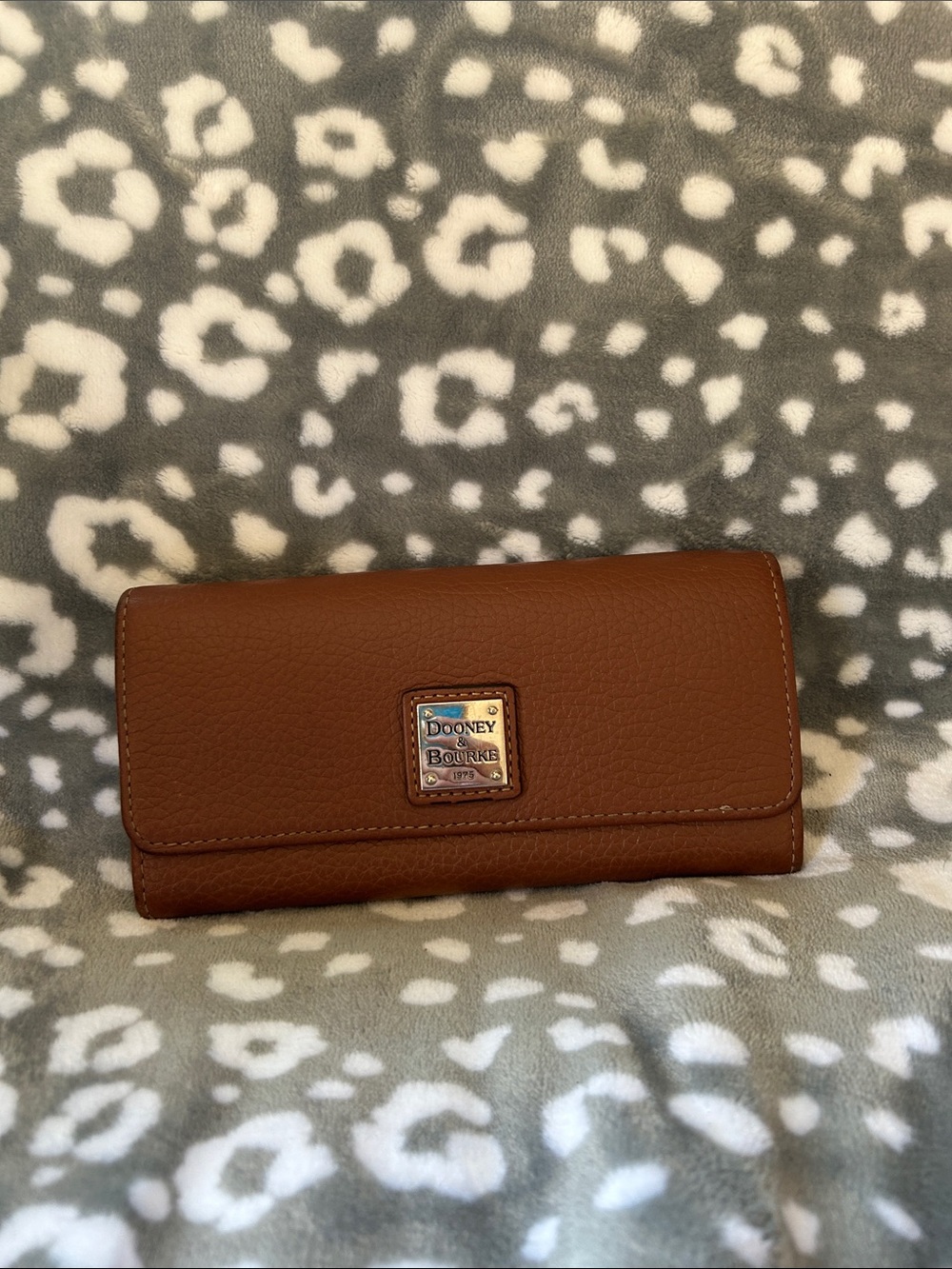 Dooney & Bourke Brown Pebbled Leather Wallet with Logo Plaque
